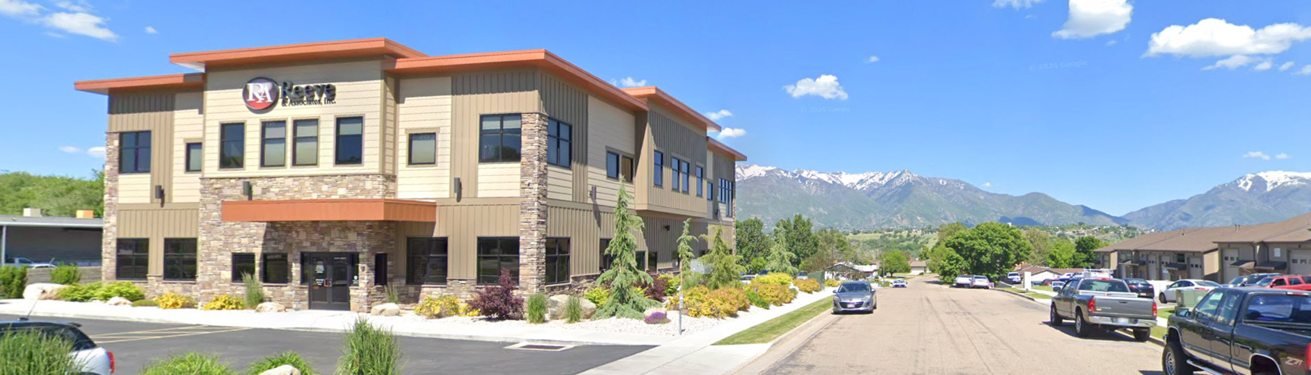building with mountains in the distance